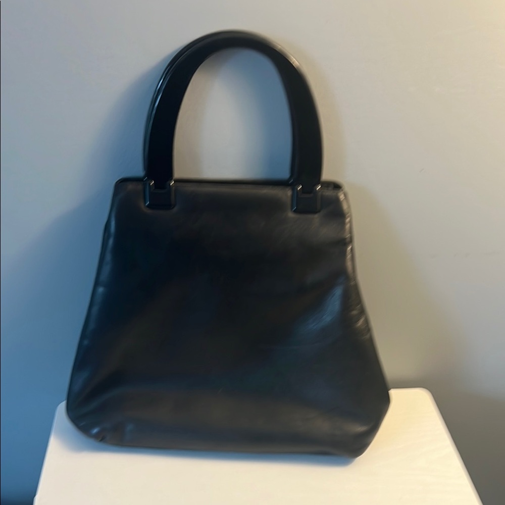 Prada Black handbag, Structured Design. Plastic handles. Good used condition